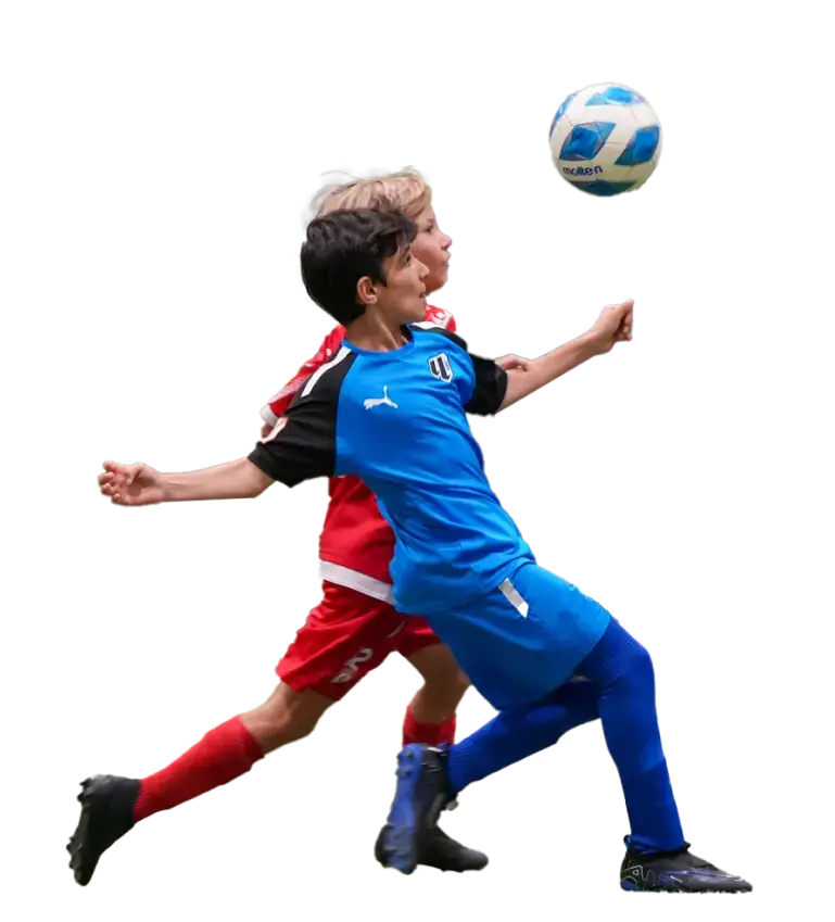 Two boys enjoying a game of soccer Two Boys Enjoying a Game of Soccer | Football Classes Near Me