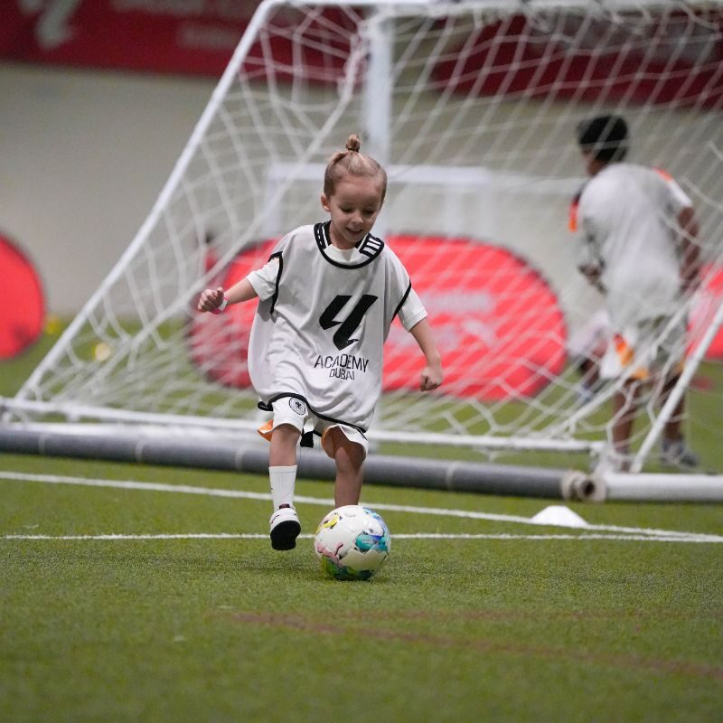 A-young-boy-during-a-spring-break-football-camp-at-LaLiga-Academy-Dubai-in-Dubai-Sports-City