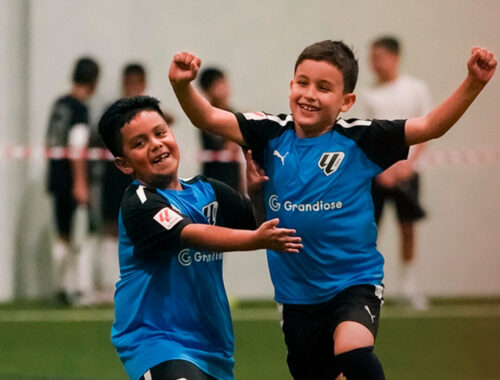 two young boys during a football camp in dubai at LaLiga Academy Dubai in Dubai Sports City